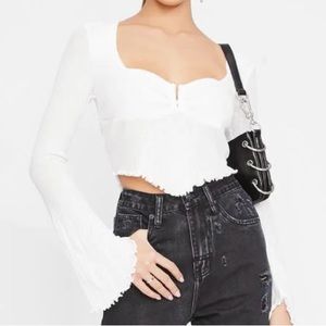 White long bell sleeve gold hardware lettuce edge trim top